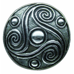Round Triskel brooch.